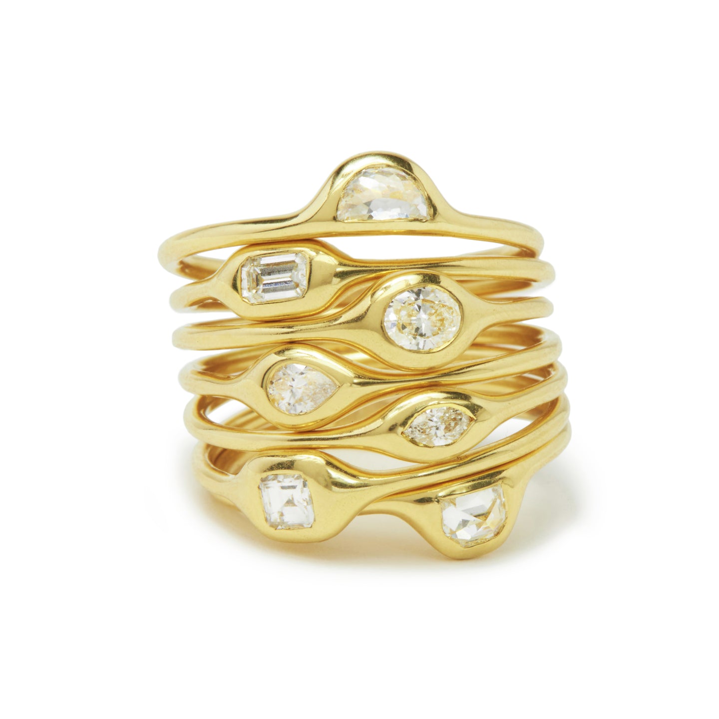 ring stack featuring 7 18k gold rings with diamond shapes - halfmoon, emerald cut, oval, pear, marquise, ascher