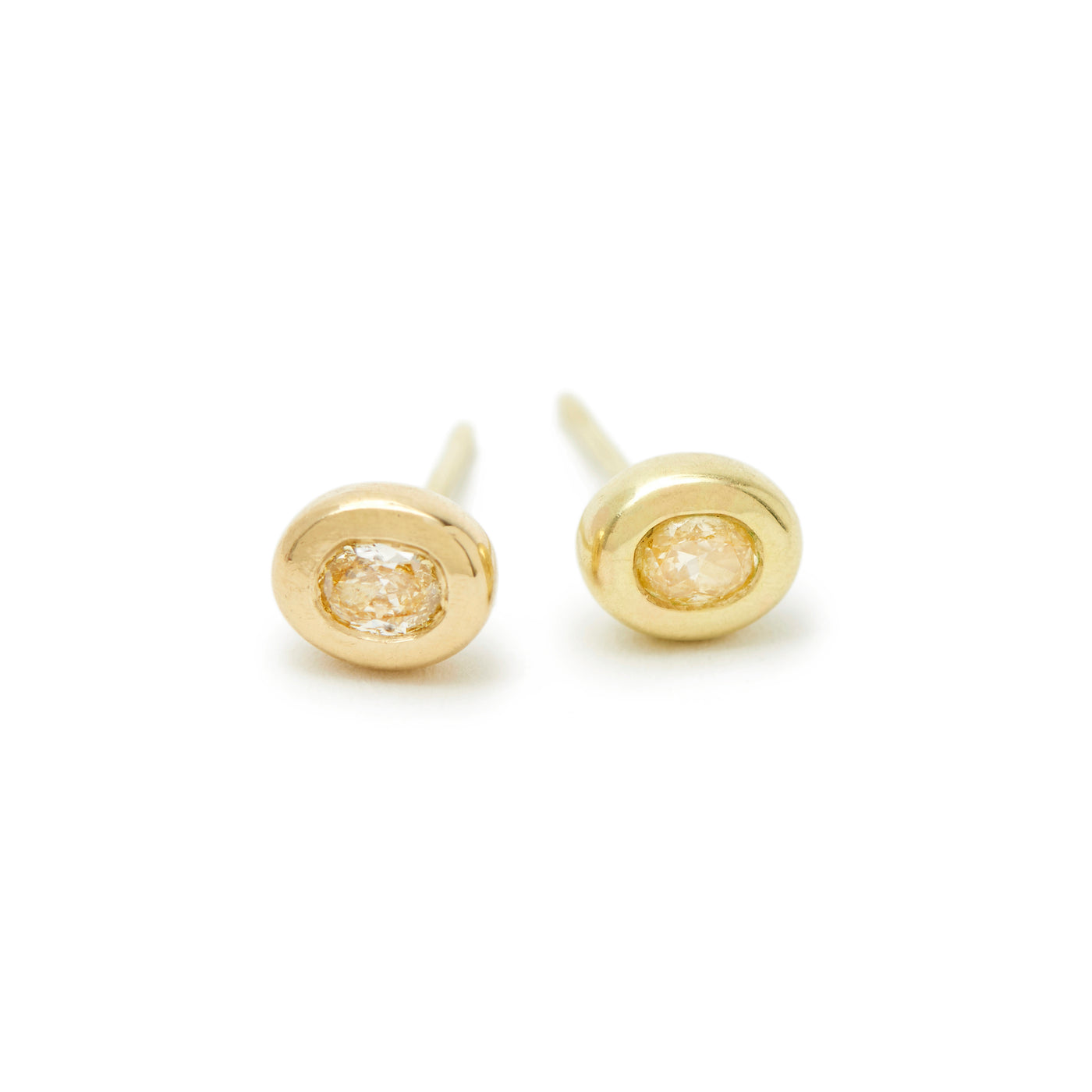 fancy yellow oval essential studs