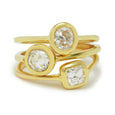 diamond solitaire rings set in 18k gold